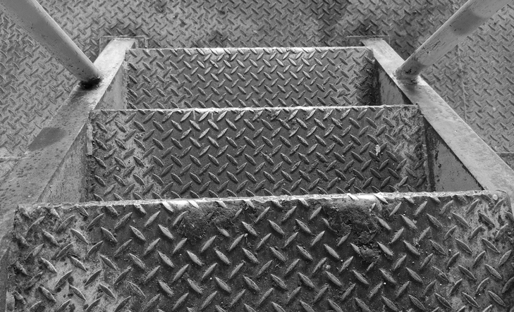 this photo is about stairs made of iron plate